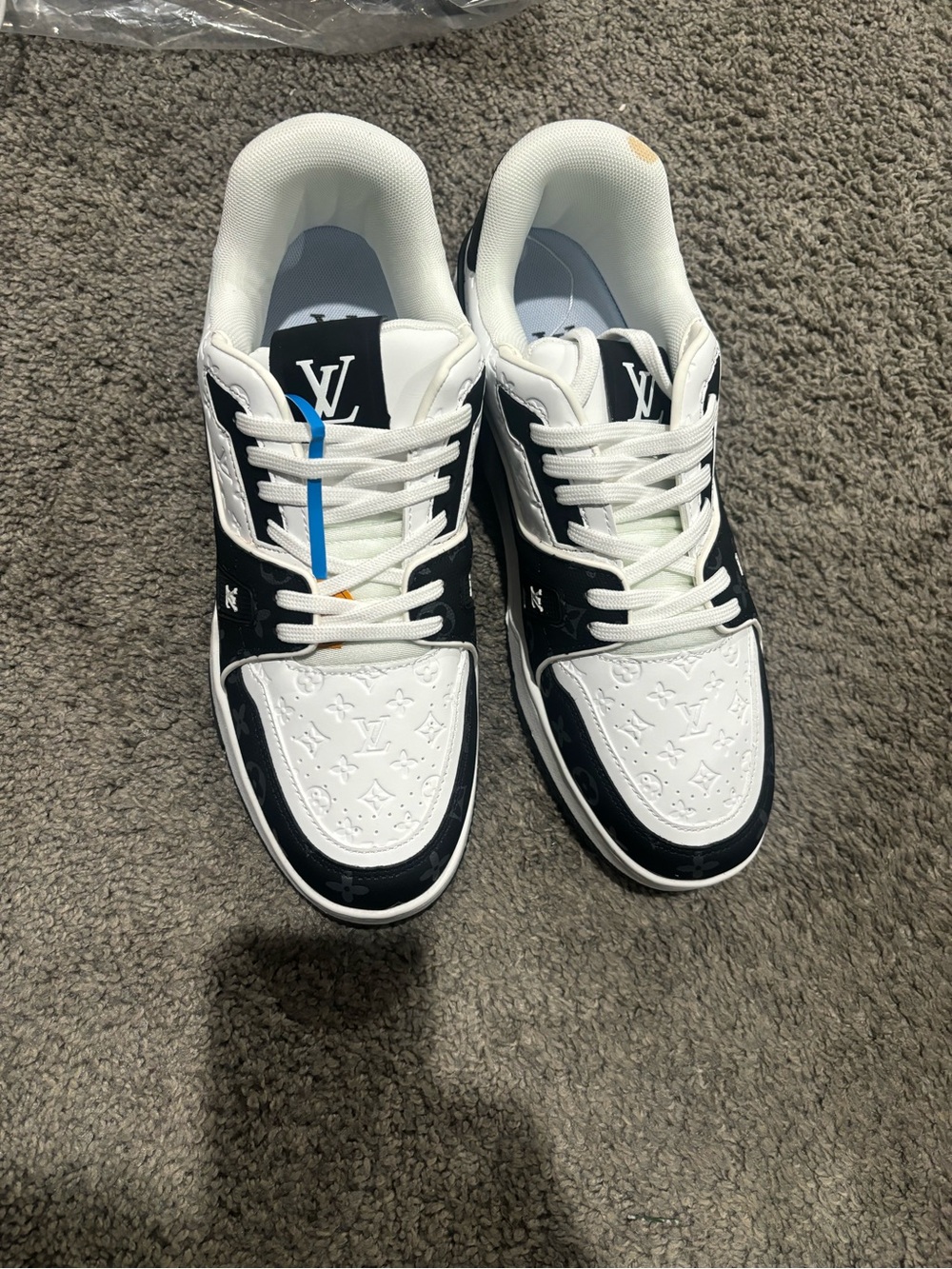 Louis Vuitton Black & White Low-Top Sneakers with Subtle Blue Accent